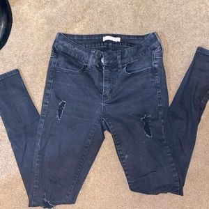 Ripped black skinny jeans